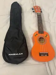 Ukelele de color naranja - 2