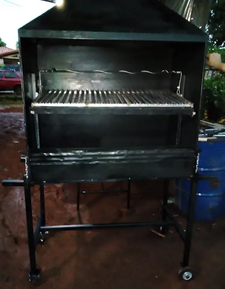 Parrilla tambor regulable con ruedas y chimenea